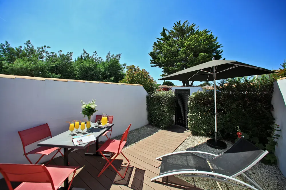 24 Terrasse avec chaise longue pour se détendre à Noirmoutier